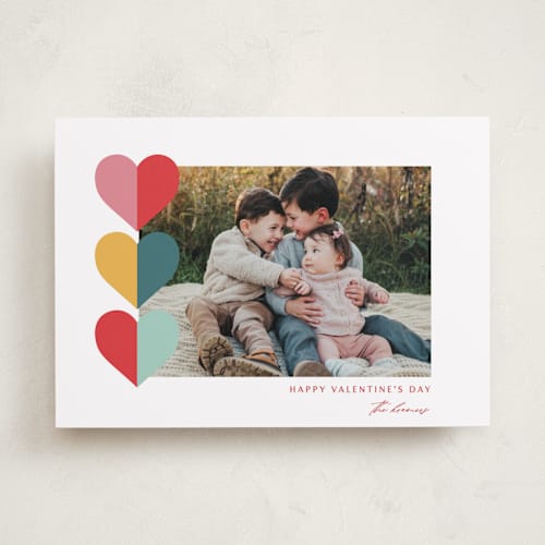 This is a confetti valentines day with standard by Leah Ragain called hearts trio printing on recycled smooth signature in standard