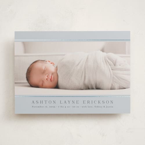 This is a denim foil stamped birth announcements with foil pressed by Jessica Williams called lined printing on signature in standard