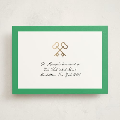This is a grass moving announcements with foil pressed by mo kelley called crossed keys printing on signature in standard