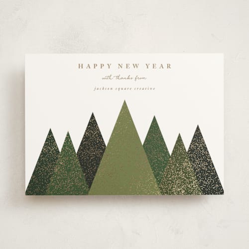 This is a fir business holiday cards with foil pressed by Roopali called shimmering christmas trees printing on signature in standard