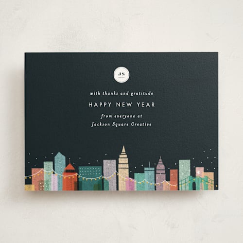 This is a navy business holiday cards with standard by Bethan called city lights printing on signature in standard