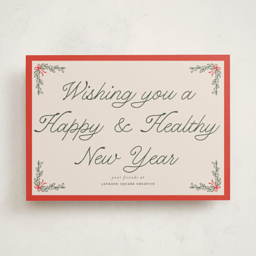 This is a cherry glaze business holiday cards with standard by Morgan Kendall called garland printing on signature in standard