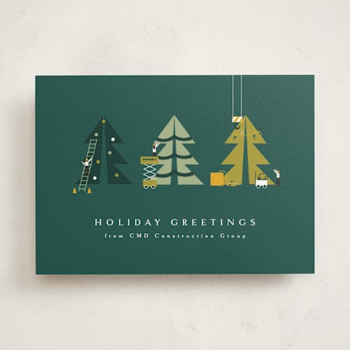 This is a fir business holiday cards with standard by Corinne Malesic called holiday construction printing on signature in standard