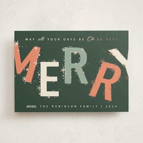This is a evergreen foil pressed holiday cards with foil pressed by Hannah Williams called merry & bright stars printing on signature in standard