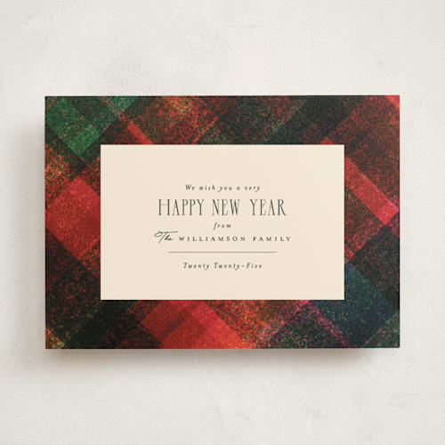 This is a cranberry non photo holiday cards with standard by Julie Murray called traditional plaid printing on signature in standard