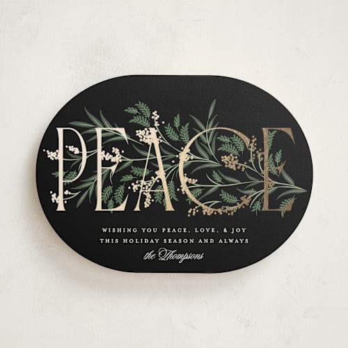 This is a coal foil pressed holiday cards with foil pressed by Robert and Stella called entwined peace printing on signature in standard