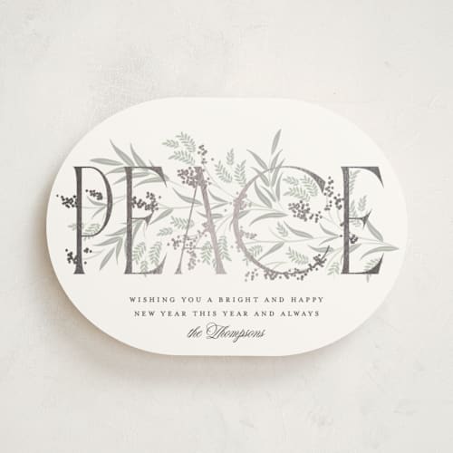 This is a snow foil pressed holiday cards with foil pressed by Robert and Stella called entwined peace printing on signature in standard