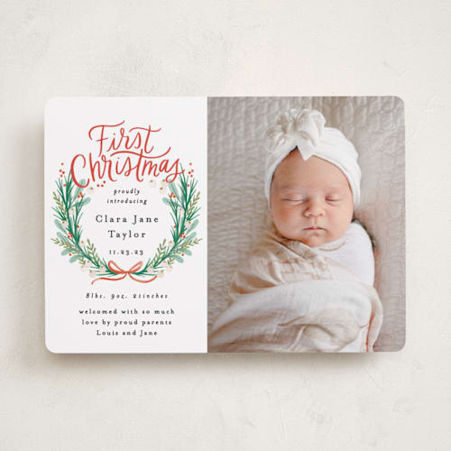 This is a berry babys first christmas with standard by Alethea and Ruth called first christmas wreath printing on recycled smooth signature in standard