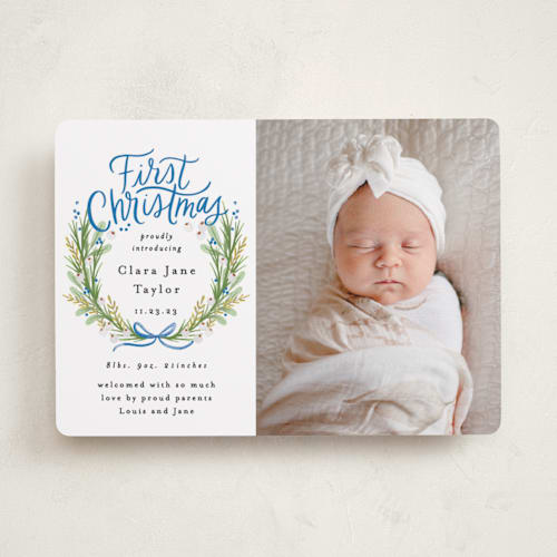This is a winter sky babys first christmas with standard by Alethea and Ruth called first christmas wreath printing on recycled smooth signature in standard