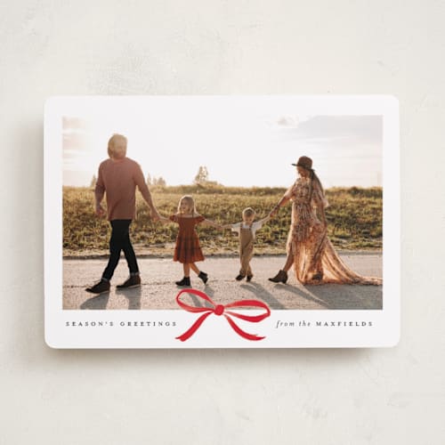 This is a crimson photo christmas cards with standard by Olivia Kanaley Inman called crimson bow printing on recycled smooth signature in standard