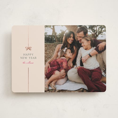 This is a gumdrop foil pressed holiday cards with foil pressed by Pixel and Hank called bow printing on recycled smooth signature in standard