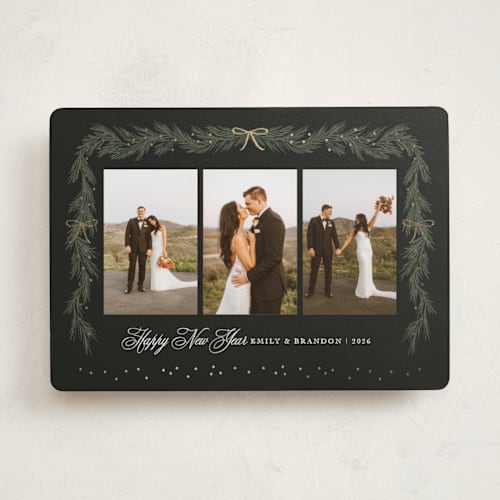 This is a midnight foil pressed holiday cards with foil pressed by Elly called ribbon garland printing on recycled smooth signature in standard