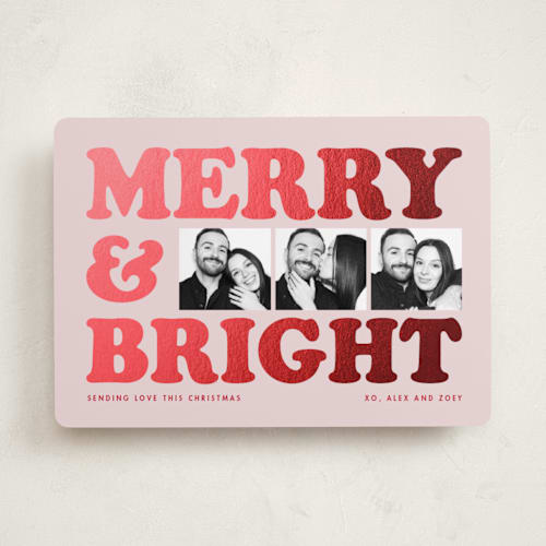 This is a candy foil pressed holiday cards with foil pressed by Snow and Ivy called big type trio printing on recycled smooth signature in standard