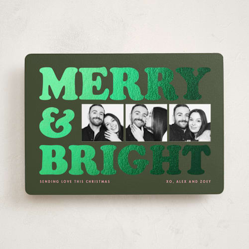This is a forest foil pressed holiday cards with foil pressed by Snow and Ivy called big type trio printing on recycled smooth signature in standard