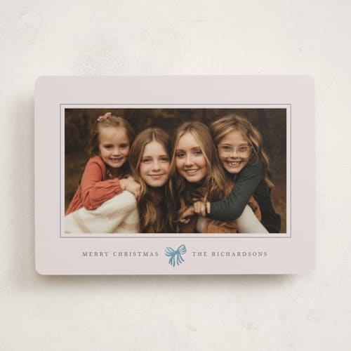 This is a celestial foil pressed holiday cards with foil pressed by Olivia Kanaley Inman called little striped bow printing on recycled smooth signature in standard