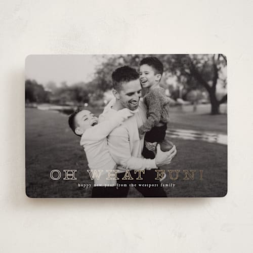 This is a snow foil pressed holiday cards with foil pressed by Up Up Creative called exclaim printing on recycled smooth signature in standard