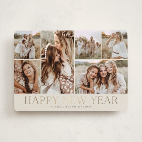 This is a coal foil pressed holiday cards with foil pressed by Kimberly Morgan called holiday photo grid printing on recycled smooth signature in standard