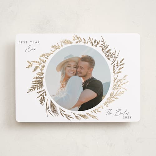 This is a snowflake foil pressed holiday cards with foil pressed by Susan Moyal called gold wreath printing on recycled smooth signature in standard