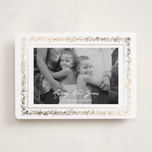 This is a snow foil pressed holiday cards with foil pressed by Cass Loh called gilded botanical frame printing on recycled smooth signature in standard