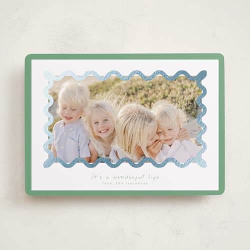 This is a spearmint foil pressed holiday cards with foil pressed by Blustery August called party squiggle printing on recycled smooth signature in standard