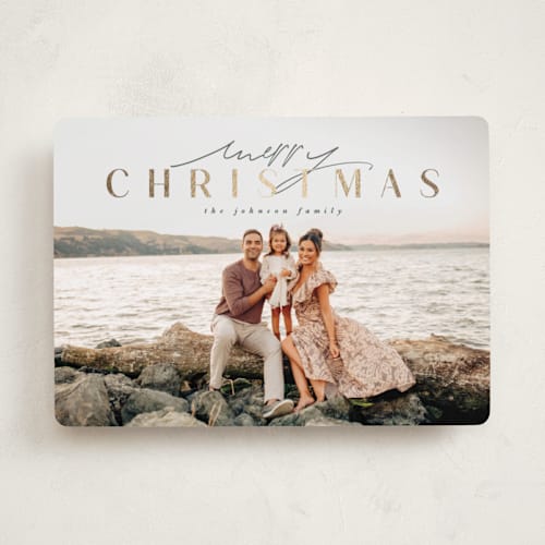 This is a frosted pines foil pressed holiday cards with foil pressed by Design Lotus called minimalist holiday glow printing on recycled smooth signature in standard