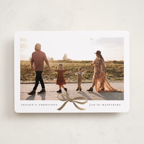 This is a hot cocoa foil pressed holiday cards with foil pressed by Olivia Kanaley Inman called crimson bow printing on recycled smooth signature in standard