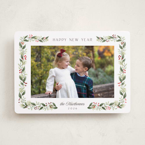 This is a holly foil pressed holiday cards with foil pressed by Randi Cirelli called berries & blooms printing on recycled smooth signature in standard