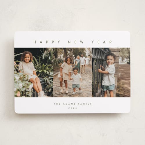 This is a snowfall new year photo cards with standard by Pippa Shaw called trilogy printing on recycled smooth signature in standard