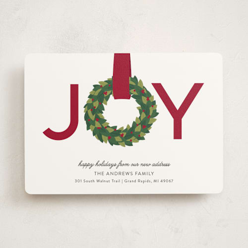 This is a cranberry non photo holiday cards with standard by Sarah Brown called joy wreath printing on signature in standard
