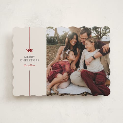 This is a poinsettia foil pressed holiday cards with foil pressed by Pixel and Hank called bow printing on recycled smooth signature in standard