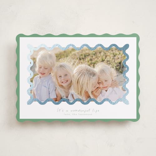 This is a spearmint foil pressed holiday cards with foil pressed by Blustery August called party squiggle printing on recycled smooth signature in standard