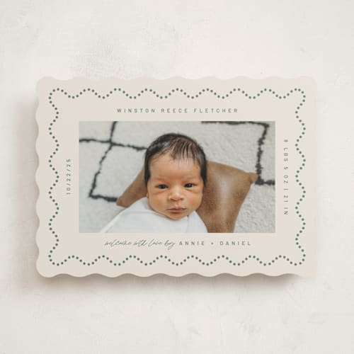 This is a moss birth announcements with standard by Kelly Ambrose called squiggle printing on signature in standard