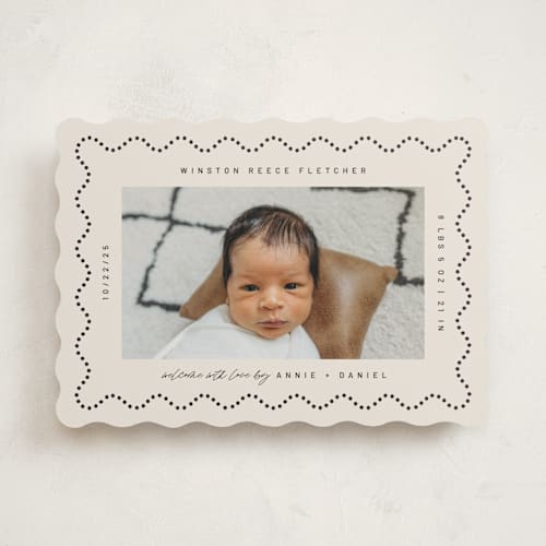 This is a licorice birth announcements with standard by Kelly Watkins called squiggle printing on signature in standard