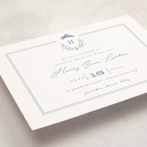 This is a cobalt blue grand birth announcements with standard by Susan Brown called classic baby monogram printing on signature in grand