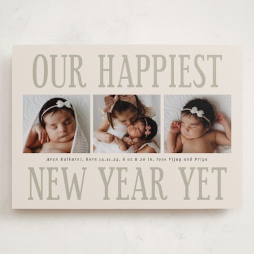 This is a champagne babys first christmas with standard by Corinne Malesic called something kind of wonderful printing on recycled smooth signature in grand