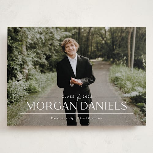 This is a eggshell graduation announcements with standard by Carolyn MacLaren called grad in overlay printing on recycled smooth signature in grand