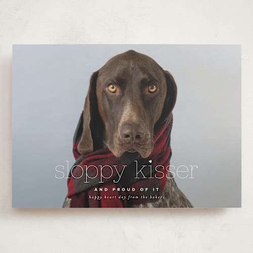 This is a cream valentines day with standard by Laura Hamm called sloppy kisser printing on recycled smooth signature in grand