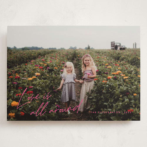 This is a fuchsia valentines day with standard by Jackie Crawford called love is all around script printing on recycled smooth signature in grand