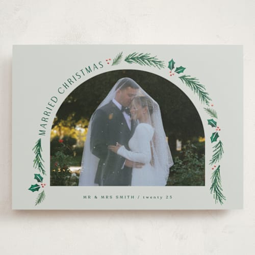 This is a sage holiday photo cards with standard by Hooray Creative called a married christmas printing on recycled smooth signature in grand