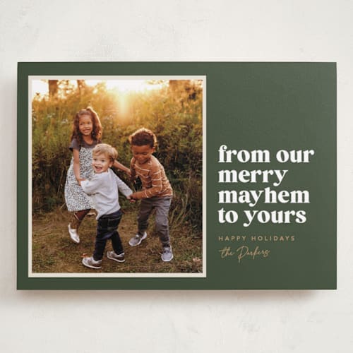 This is a pine holiday photo cards with standard by Robert and Stella called our merry mayhem printing on recycled smooth signature in grand
