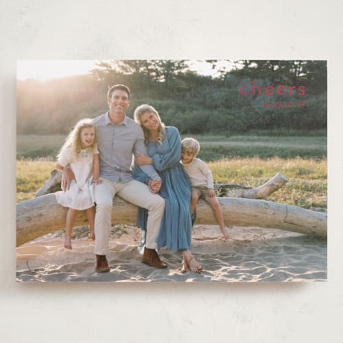 This is a poinsettia holiday photo cards with standard by Amy Kross called emblem printing on recycled smooth signature in grand