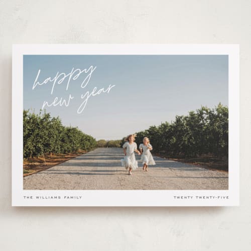 This is a delicate holiday photo cards with standard by Pixel and Hank called keepsake printing on recycled smooth signature in grand