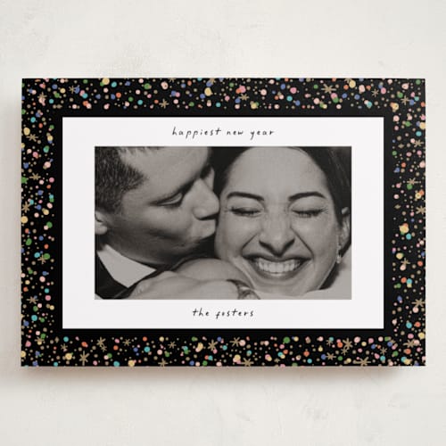 This is a popped holiday photo cards with standard by Pixel and Hank called confetti and sparkle printing on recycled smooth signature in grand