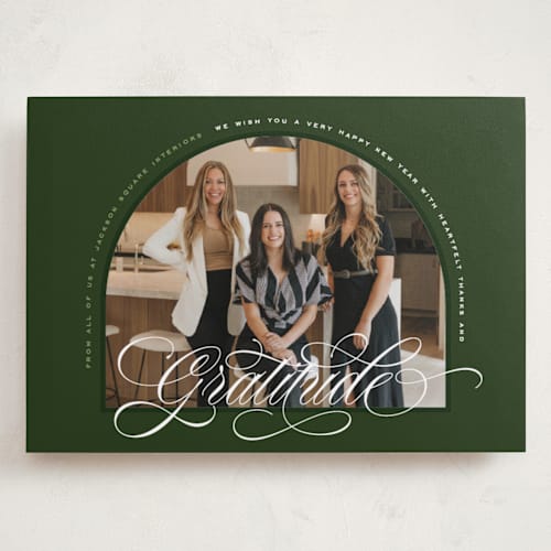 This is a spruce holiday photo cards with standard by Owl and Toad called archway printing on recycled smooth signature in grand