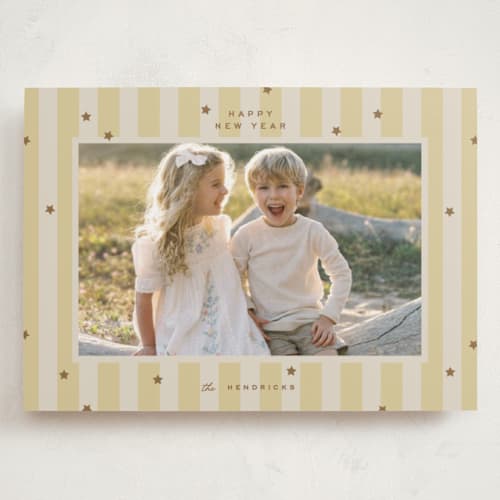 This is a butter holiday photo cards with standard by Ellen Schlegelmilch called stars & stripes printing on recycled smooth signature in grand