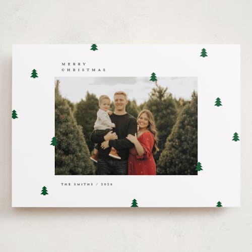 This is a cotton holiday photo cards with standard by Michelle Taylor called scattered trees printing on recycled smooth signature in grand