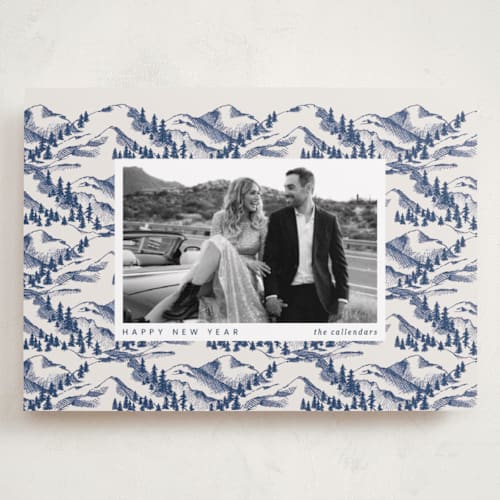 This is a navy holiday photo cards with standard by Anna Black called hills and glens printing on recycled smooth signature in grand