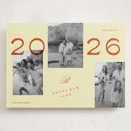 This is a buttercream holiday photo cards with standard by Rachel Cassel called a bold year printing on recycled smooth signature in grand