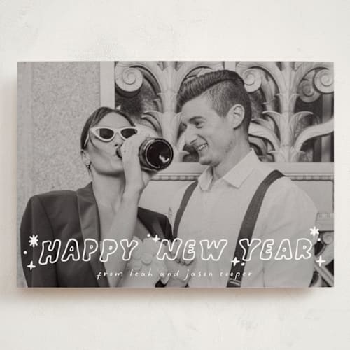 This is a starlight holiday photo cards with standard by Everett Paper Goods called pizazz printing on recycled smooth signature in grand