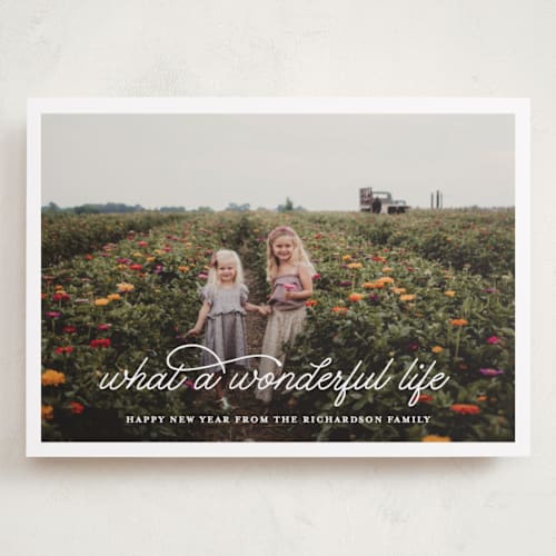 This is a snowflake holiday photo cards with standard by Leah Ragain called what a wonderful life printing on recycled smooth signature in grand